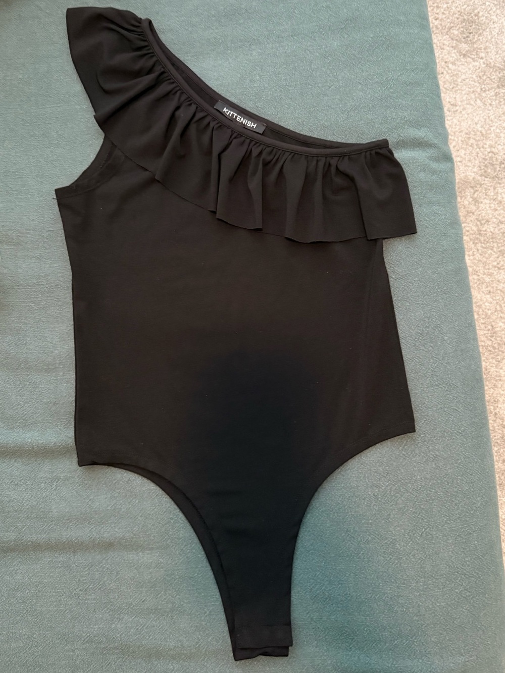 Kittenish One shoulder Black Ruffle Bodysuit